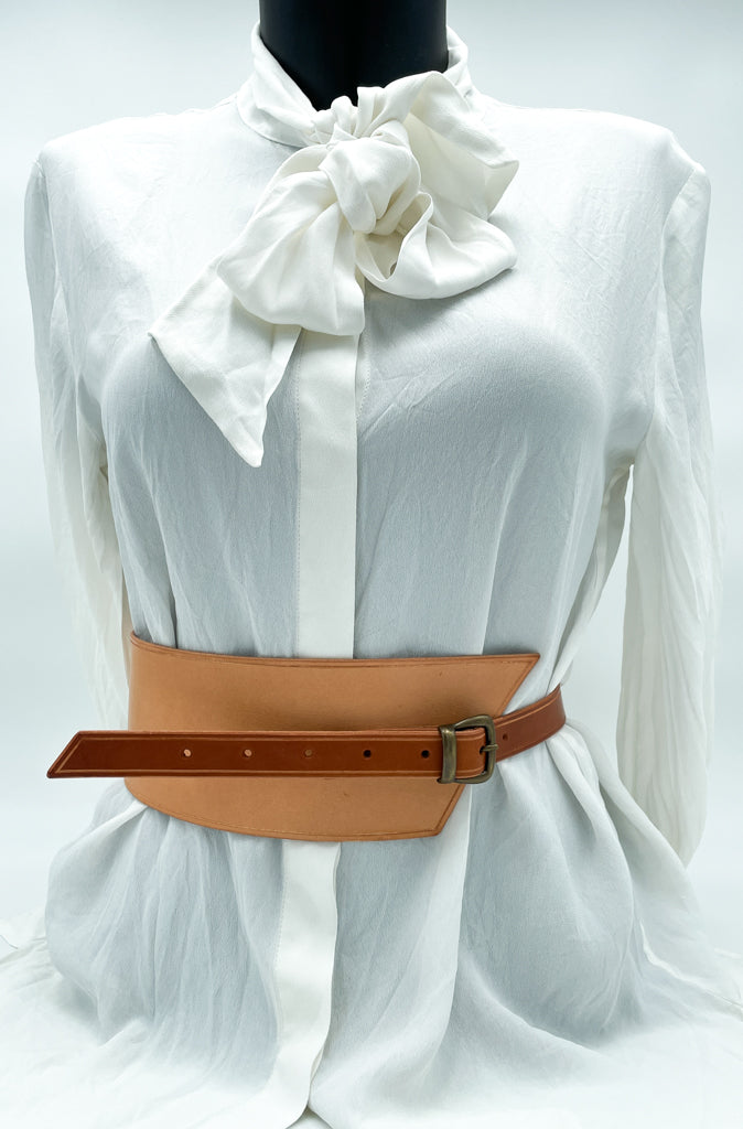 Handmade asymmetrical leather underbust belt with bronze buckles and adjustable strap for the perfect hourglass silhouette