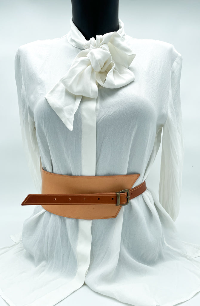 Handmade asymmetrical leather underbust belt with bronze buckles and adjustable strap for the perfect hourglass silhouette